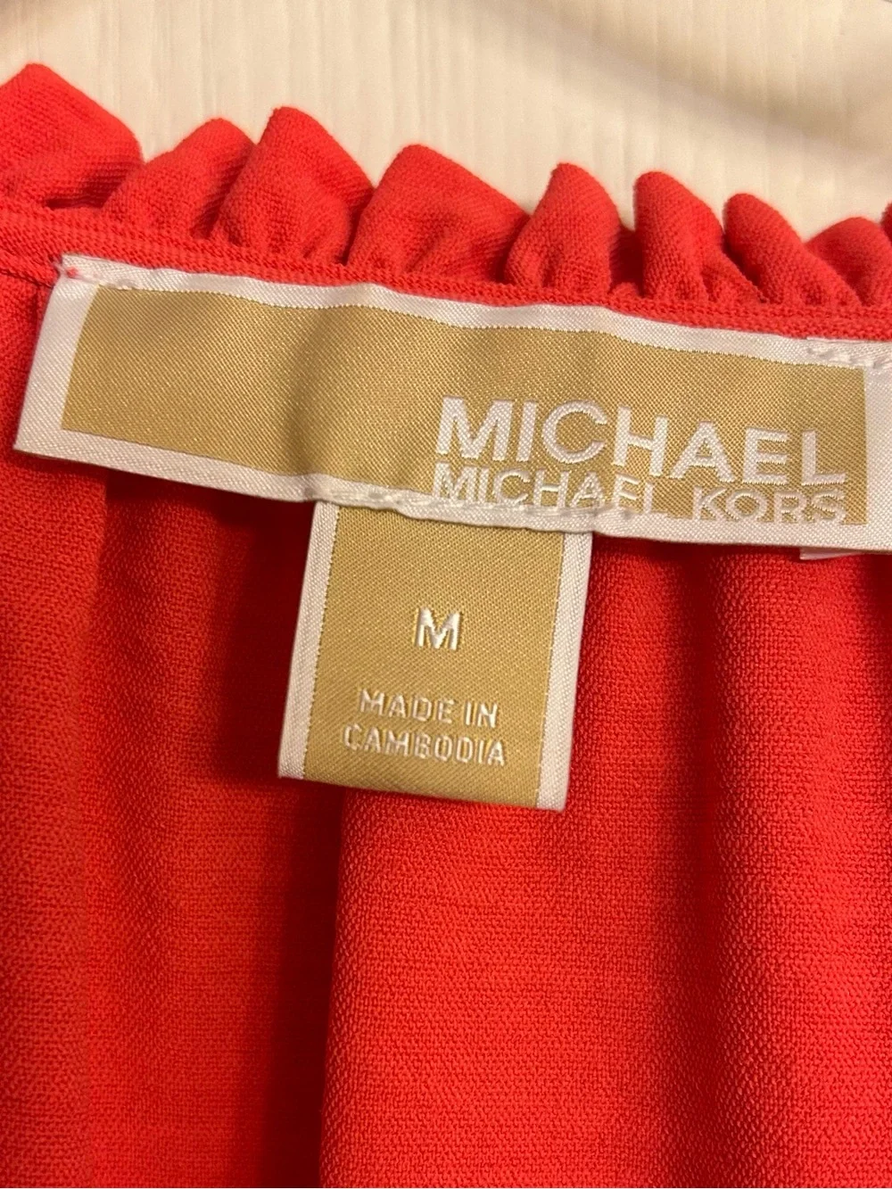 MICHAEL KORS NWOT Bright Coral Ruffle Tie Neck Ladies Cap-Sleeve Blouse Size M.